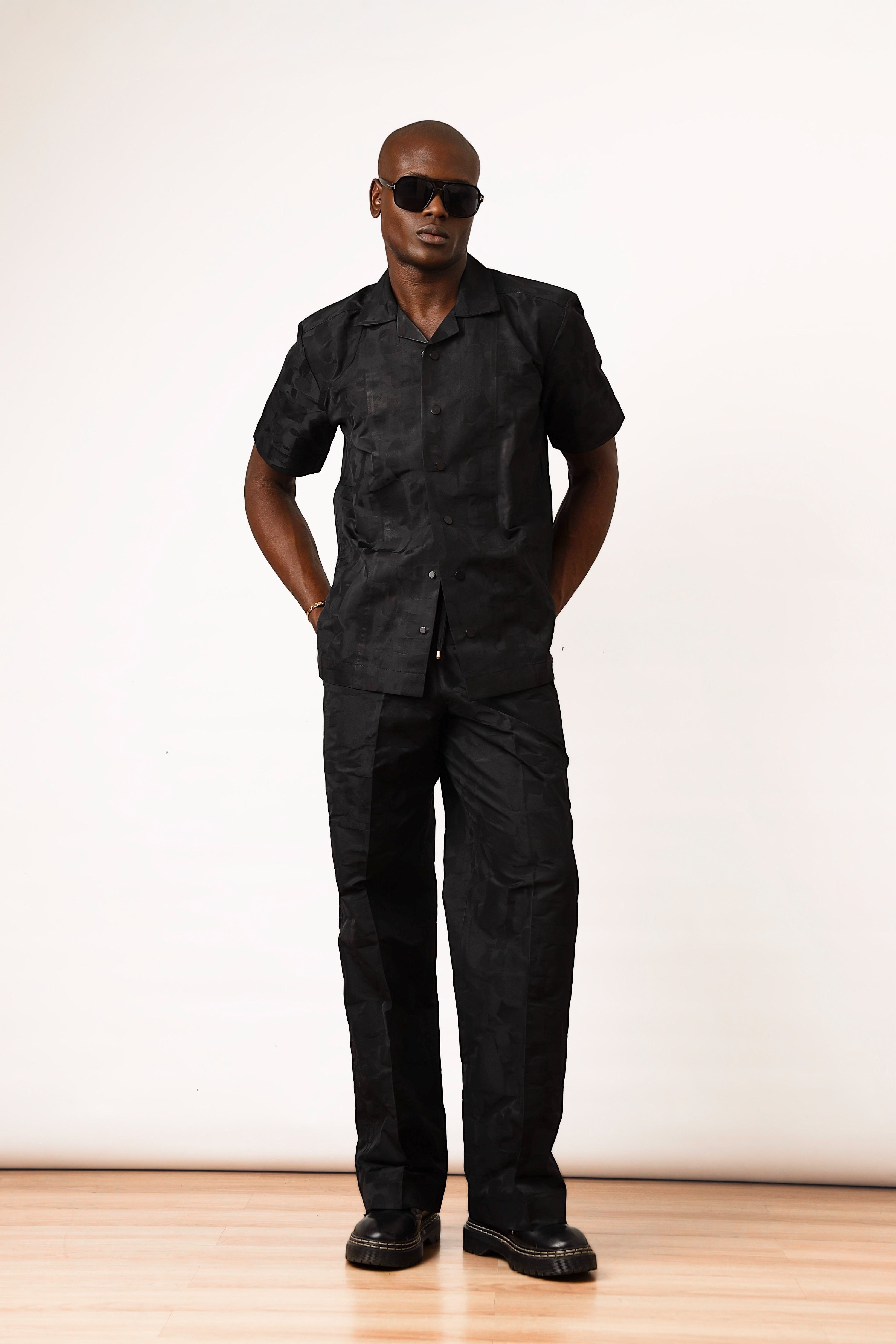 Shop Frugal black brocade Cuban shirt with short sleeves and textured weave. Model wears size L.